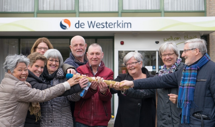 Estafettestok vrijwilligerswerk naar de Westerkim